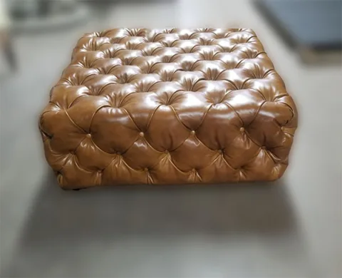 Ottoman-4 — Ottoman in leather, with tufted detailing and a hardwood frame